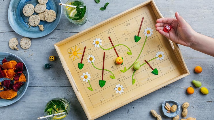 Für Spielernaturen und Naschkatzen: wenn der Apéro gleich auf dem Brettspiel serviert wird.